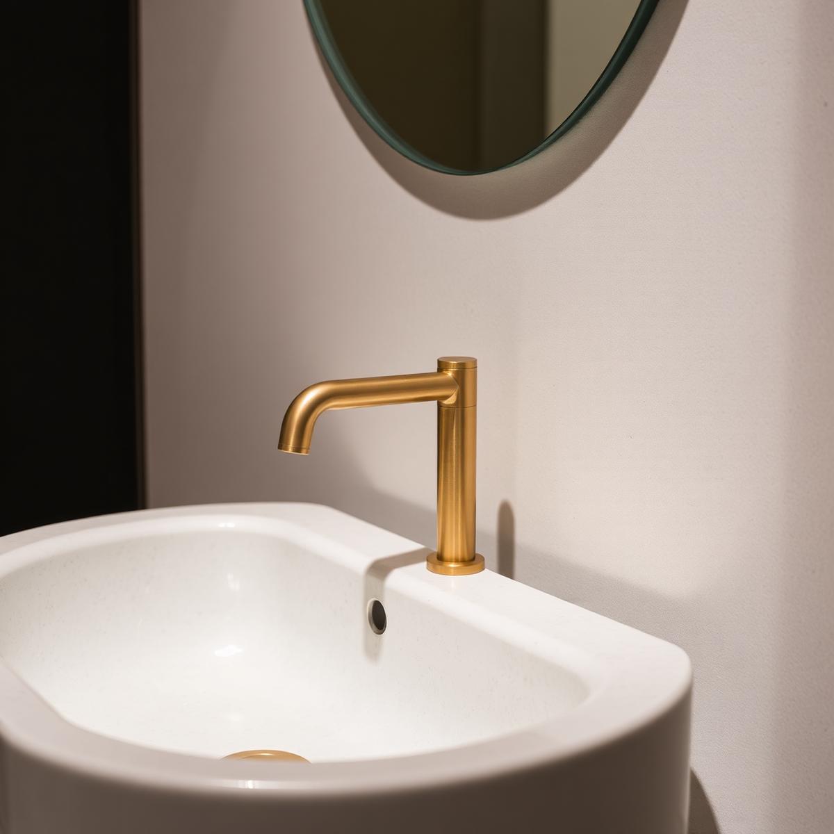 Brass tap detail in a premium bathroom